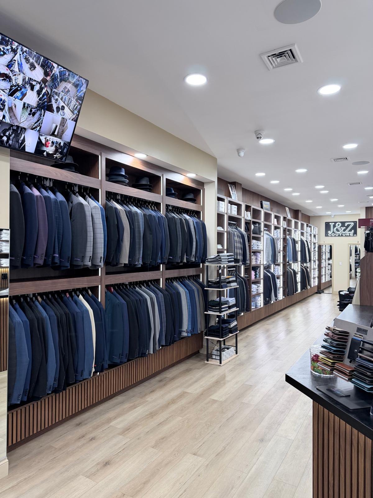 A wall of suits at J&Z Couture